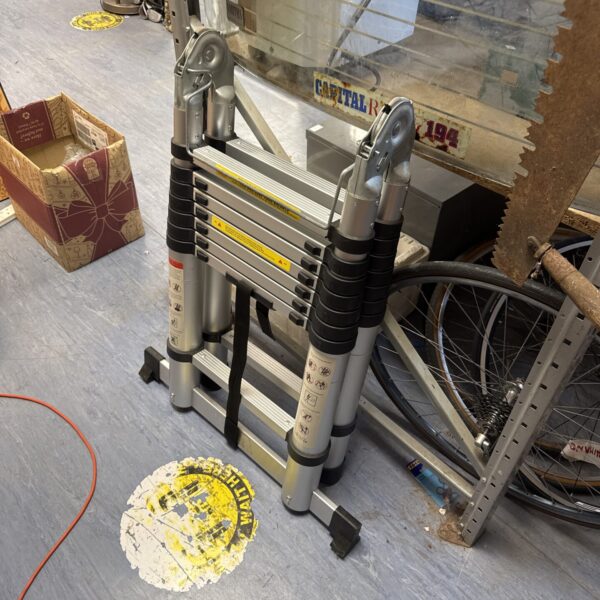 Used extendable ladder for household tasks and DIY projects.
