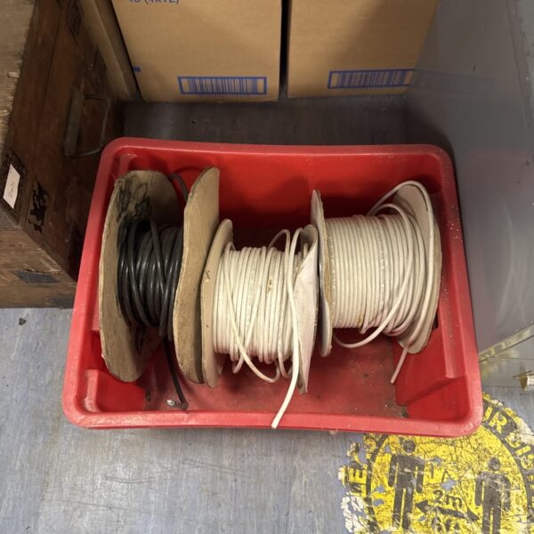 Lot of three partial rolls of used networking cable.