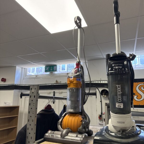 Used Dyson DC24 upright hoover with ball technology for home cleaning.