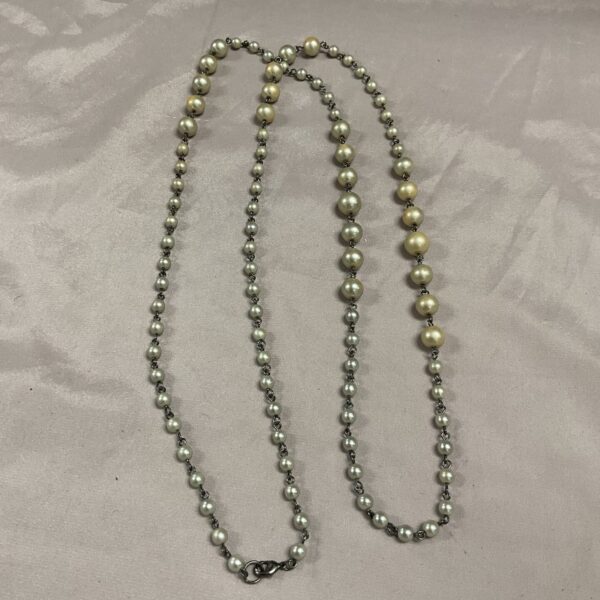 Classic 24 inch faux pearl necklace strand.