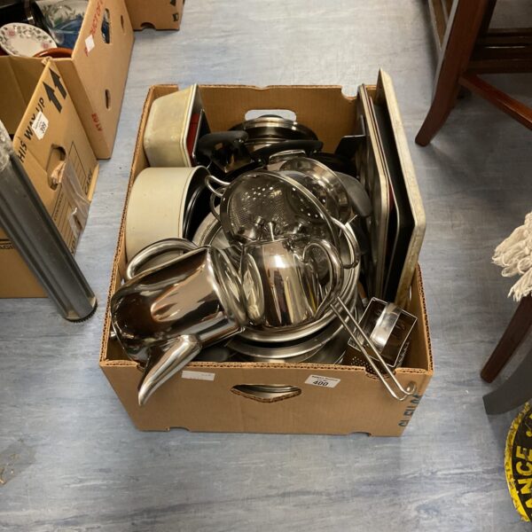 Mixed kitchenware lot with pots, muffin tins and crockery.