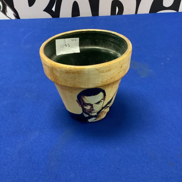 Vintage James Bond plant pot featuring Sean Connery.