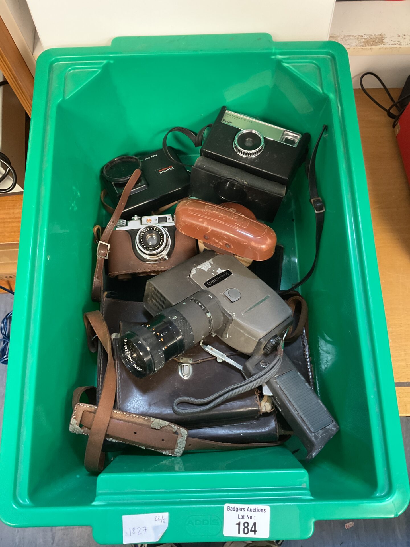 184 Box of vintage cameras including kodak, halina & canon
