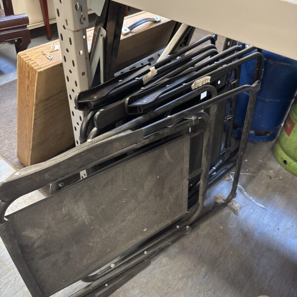 Lot of four vintage metal folding chairs for events.
