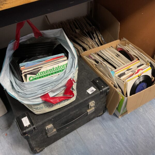 Vintage DJ case filled with a large 7-inch vinyl record collection.