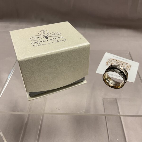 Close-up of sterling silver spinner ring size Q.