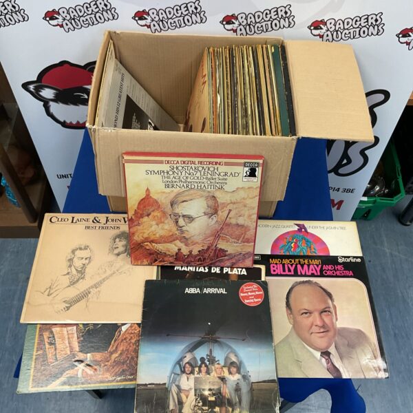 Overview of a vintage vinyl record collection with various LP covers.