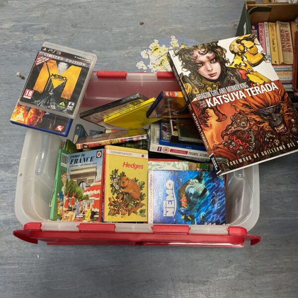 Vintage book and DVD lot including Ladybird books, a nostalgic collection.