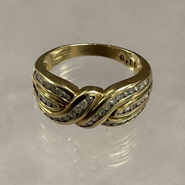 Elegant 9ct gold diamond crossover ring, size O.