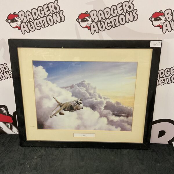 Framed Colin Walker print of a Harrier Jump Jet in flight.