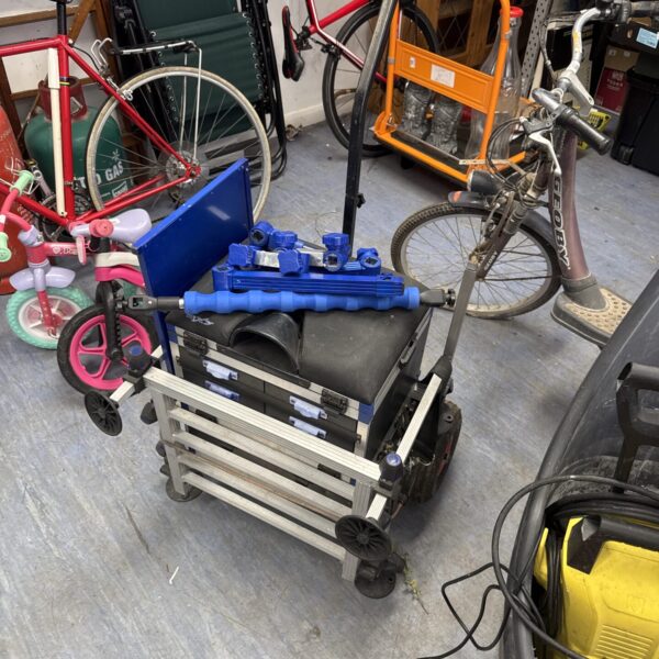 Portable Rx7 fishing trolley box with attachments for tackle.