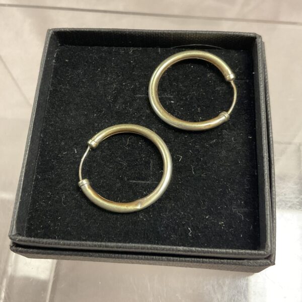Elegant 9ct white gold hoop earrings, a classic jewellery piece.