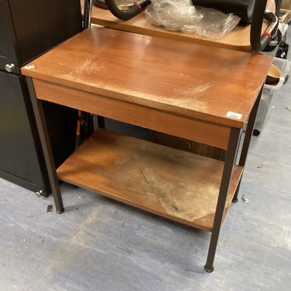Sturdy workshop craft table with metal frame and wooden top.