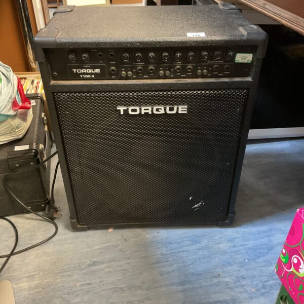 Vintage Torque T100-3 guitar amplifier in black cabinet.