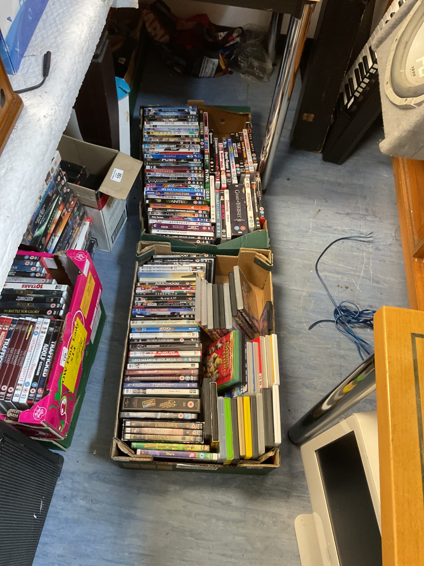 183 Two trays of mixed dvds