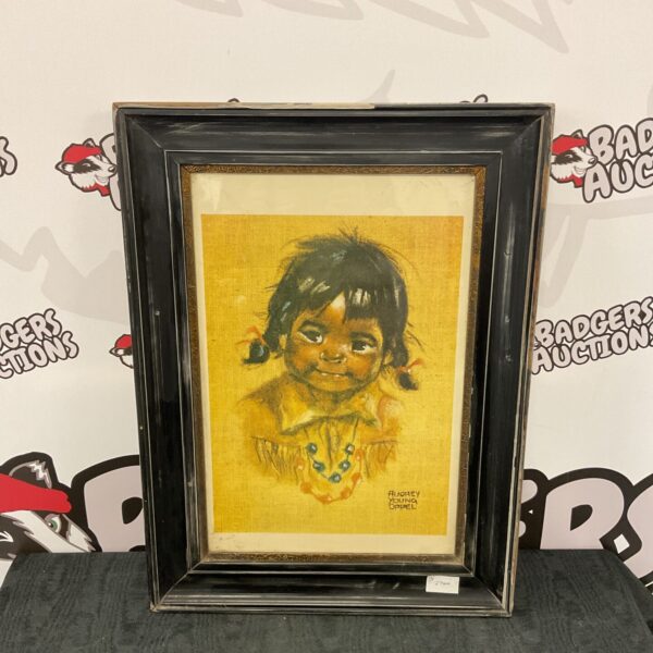 Framed Audrey Young Oppel print of a young girl's portrait.