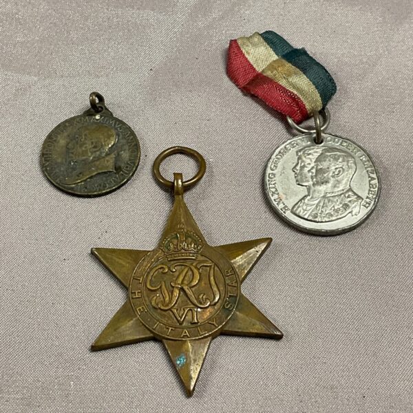 WWII Italy Star medal lot with George VI Coronation and religious medal.