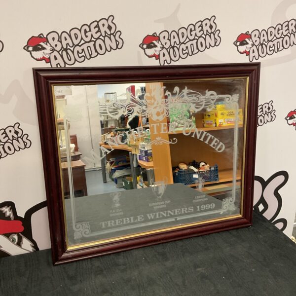 Manchester United 1999 treble winners mirror for football fans.