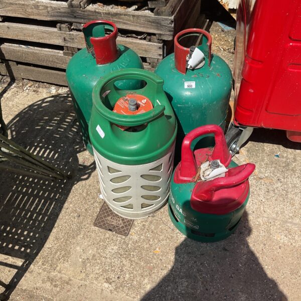 Lot of four used gas bottles including Calor Gas.
