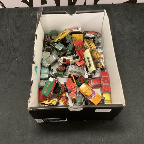Vintage Matchbox diecast car lot with various models.