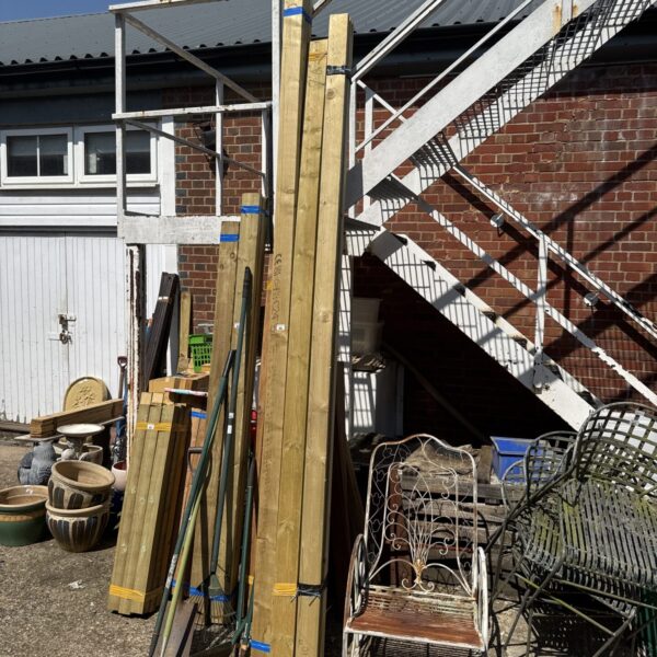Garden view of timber bundles ready for construction projects.