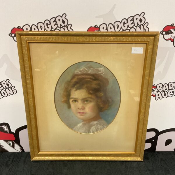 Vintage 1930s pastel portrait of a young girl in a gilt frame.