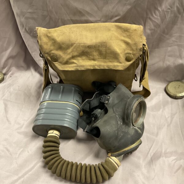 Vintage WW2 Siebe Gorman gas mask with carrying bag.