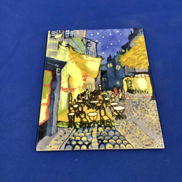 Vintage Portuguese tile wall hanging depicting a lively street scene.