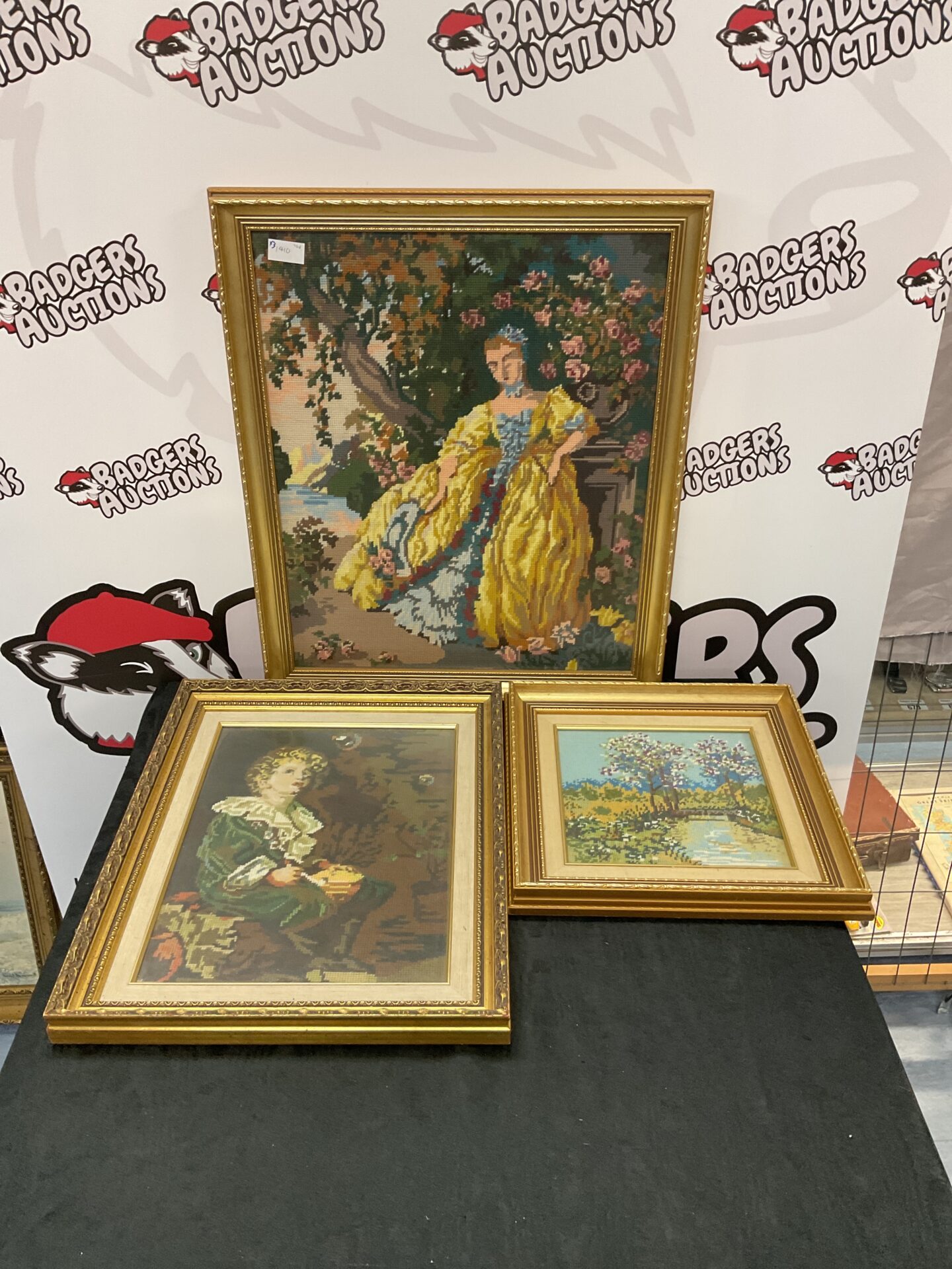607 Three gilt framed embroideries including pears bubbles