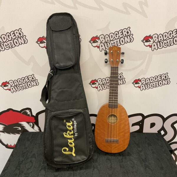 Vintage Richwood UK-185 ukulele with case, a classic musical instrument.
