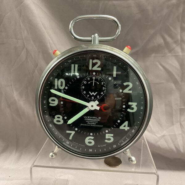 Front view of a vintage Wehrle Commander alarm clock.
