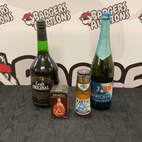 Vintage alcohol bottle collection featuring Croft Original and Babysham.