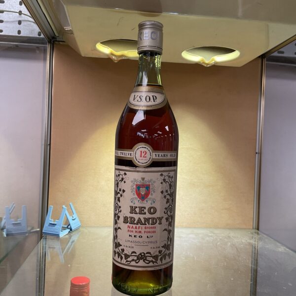 Vintage KEo Brandy bottle from Naafi H M Forces 1976