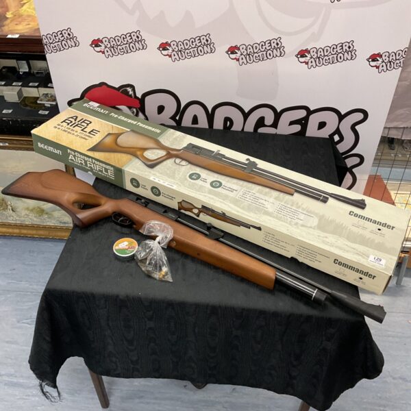 Beeman model 1518 .22 caliber PCP air rifle with scope.
