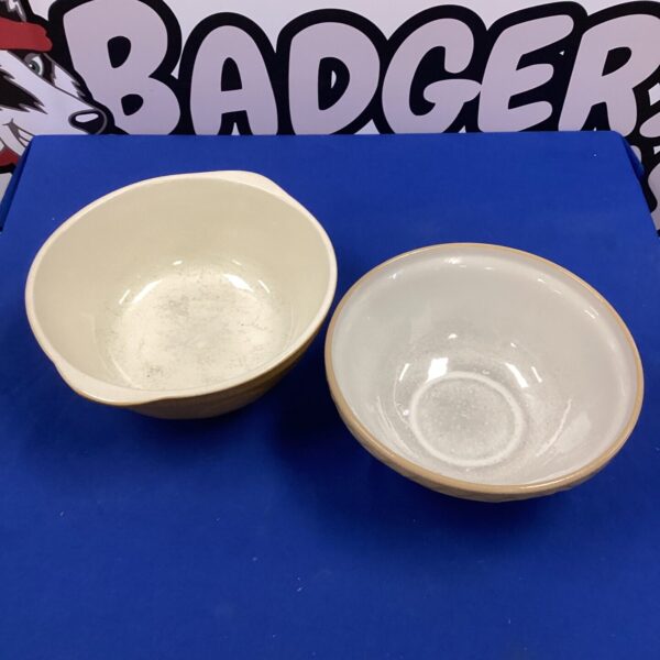 Two vintage ceramic mixing bowls, ideal for kitchen use.
