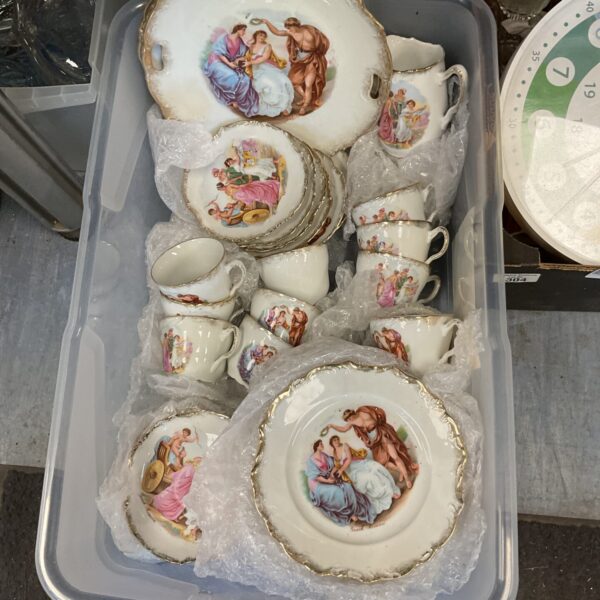 Vintage bone china tea service with Roman scene decoration.