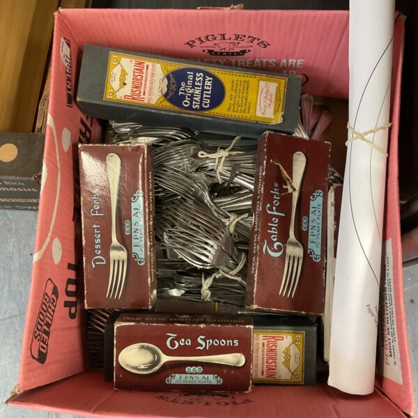 Vintage cutlery set in original packaging, stainless steel tableware.