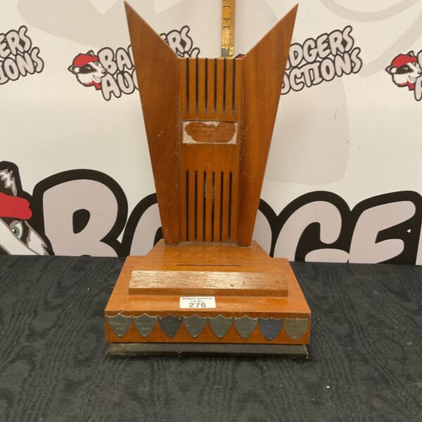 Vintage Art Deco farm trophy stand with shield details.