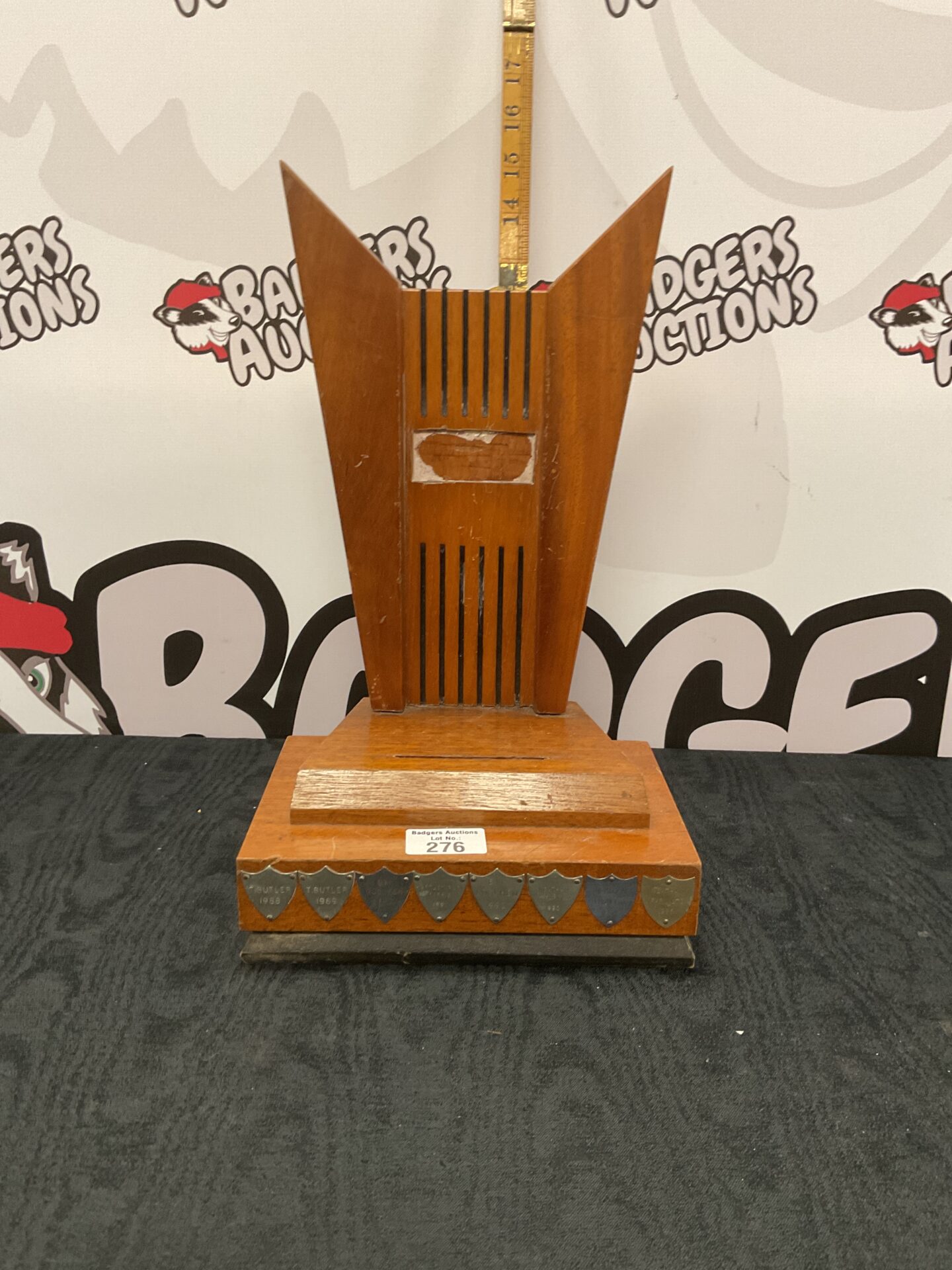 276 Art deco farm related trophy stand with shields aroun base