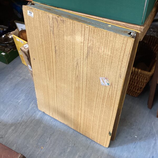 Vintage pasting table with a solid wood surface.