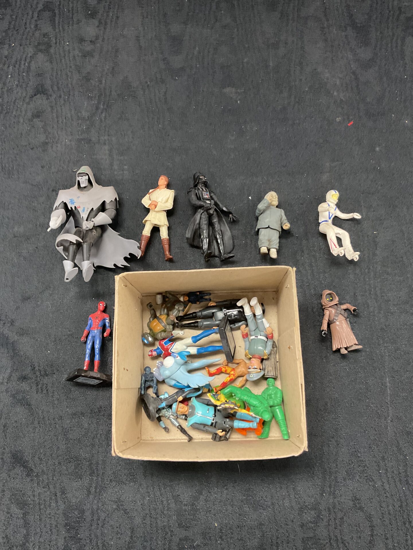 368 Box of toy figures including star wars