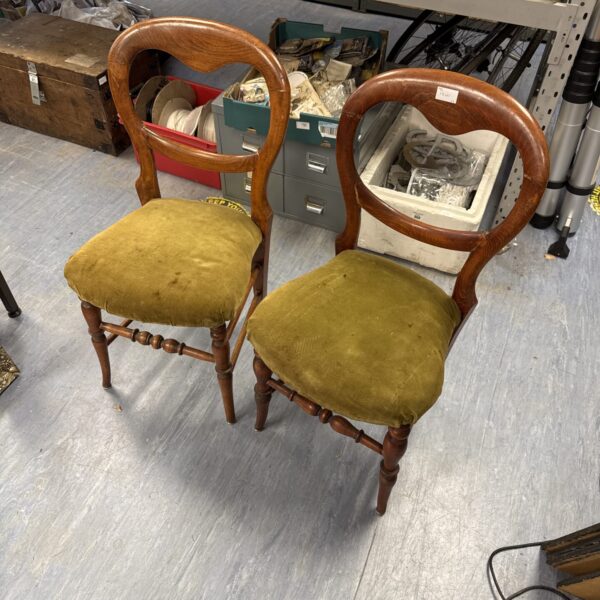 Pair of antique Victorian mahogany hall chairs with balloon backs.