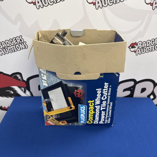 Plasplugs compact electric tile cutter in a box.