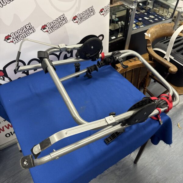 Silver Exodus car bicycle rack with black straps.