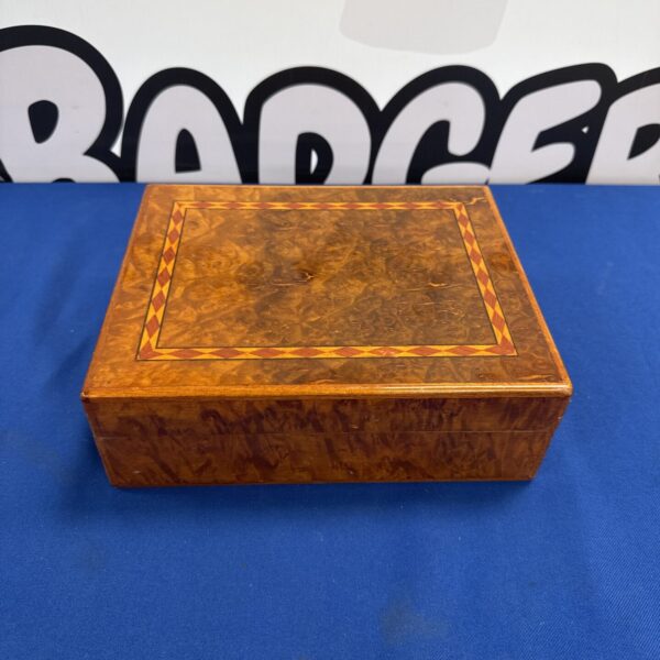Vintage cigar humidor box with marquetry inlay.