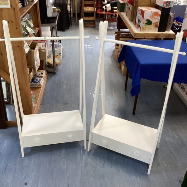 White childrens clothes rail for bedroom storage and organisation.