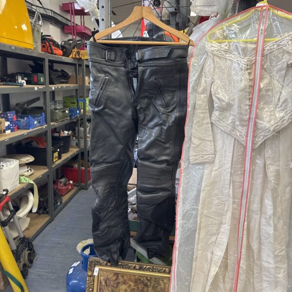 Front view of vintage Belstaff motorcycle leather trousers.