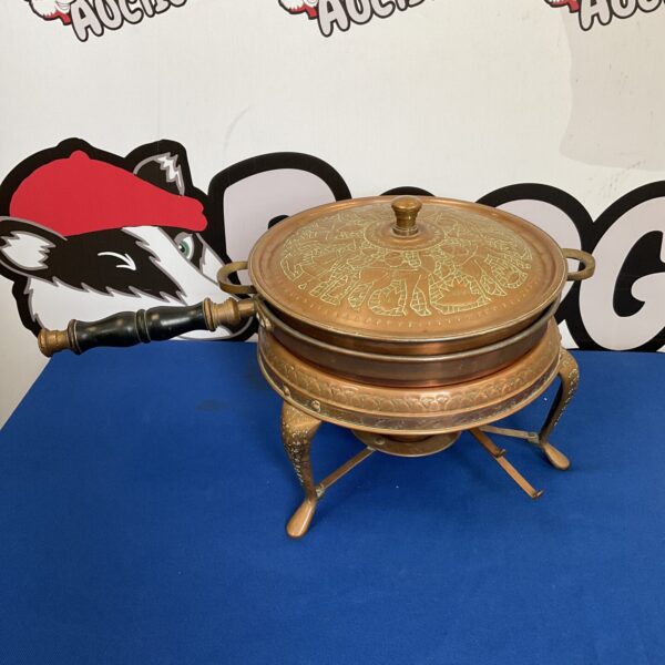 Vintage Nader Oriental copper cooking pan with embossed details.