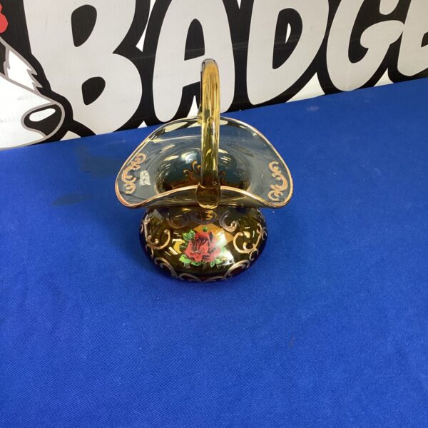 Vintage Bohemian glass basket with vibrant floral design.