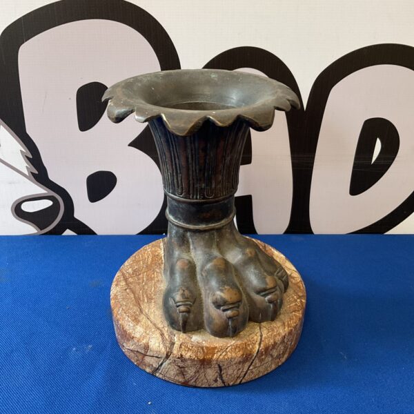 Vintage bronze lion foot vase on marble base, unique collectible.